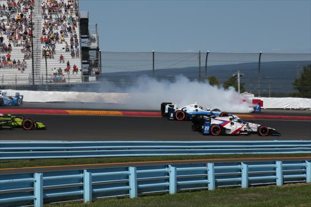 Mikhail Aleshin engulfed in smoke during his spin at the start of the INDYCAR Grand Prix at The Glen from Watkins Glen International -- Photo by: Chris Jones