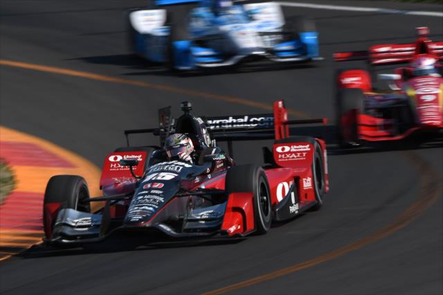 Graham Rahal leads a group diving into Turn 11 during the INDYCAR Grand Prix at The Glen from Watkins Glen International -- Photo by: Chris Owens