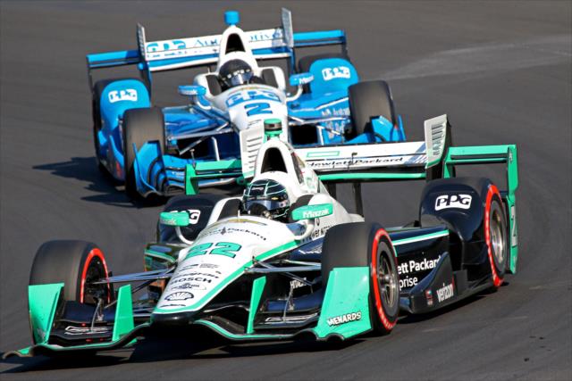 Teammates Simon Pagenaud and Juan Pablo Montoya roll through Turn 7 during the INDYCAR Grand Prix at The Glen from Watkins Glen International -- Photo by: Mike Harding