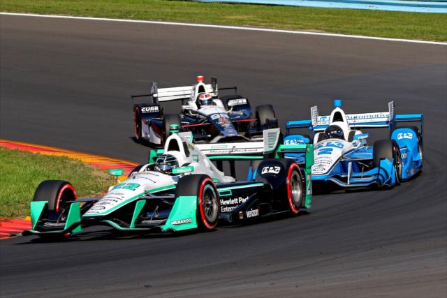 Simon Pagenaud leads Juan Pablo Montoya and Alexander Rossi through Turn 7 during the INDYCAR Grand Prix at The Glen from Watkins Glen International -- Photo by: Mike Harding