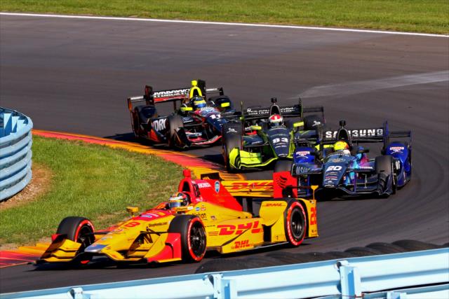 Ryan Hunter-Reay leads a group through Turn 7 during the INDYCAR Grand Prix at The Glen from Watkins Glen International -- Photo by: Mike Harding