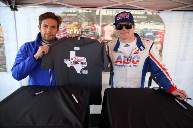 Carlos Munoz and Conor Daly show off the #Race4Houston shirts supporting relief efforts for Houston at Watkins Glen International -- Photo by: Chris Jones