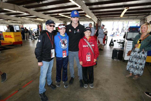 Alexander Rossi meets a few young fans in the Watkins Glen International garage area -- Photo by: Chris Jones