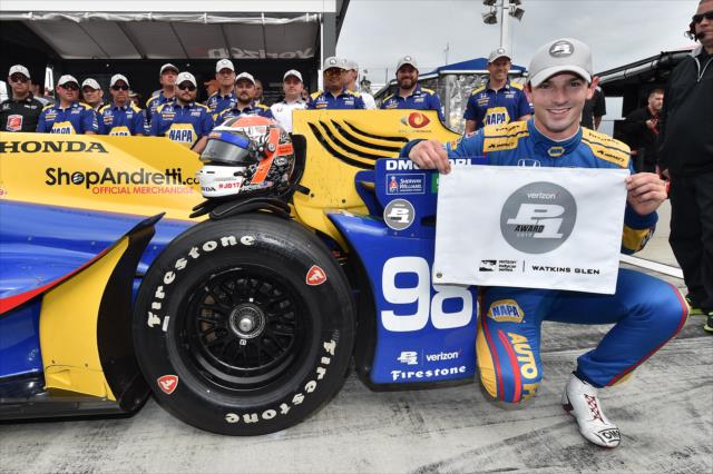 Alexander Rossi with the Verizon P1 Award flag after winning the pole position for the INDYCAR Grand Prix at The Glen -- Photo by: Chris Owens