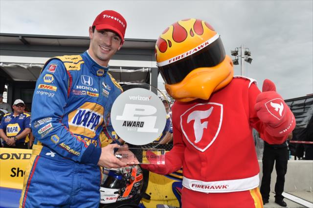 Alexander Rossi with the Verizon P1 Award after winning the pole position for the INDYCAR Grand Prix at The Glen -- Photo by: Chris Owens