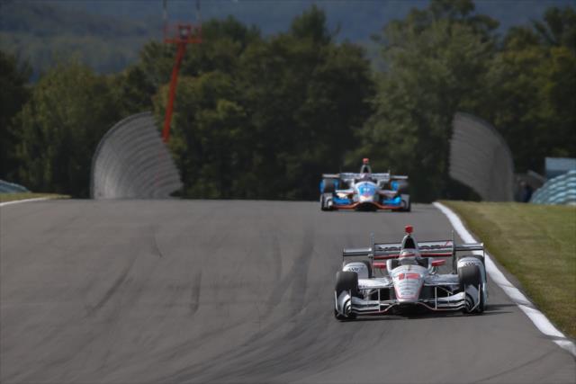 Will Power and Scott Dixon sail up the hill toward Turn 8 during practice for the INDYCAR Grand Prix at The Glen from Watkins Glen International -- Photo by: Joe Skibinski