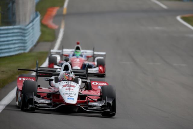 Graham Rahal and Conor Daly set up for Turn 10 during qualifications for the INDYCAR Grand Prix at The Glen -- Photo by: Joe Skibinski