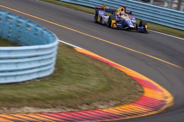Alxander Rossi sets up for Turn 11 during qualifications for the INDYCAR Grand Prix at The Glen -- Photo by: Joe Skibinski